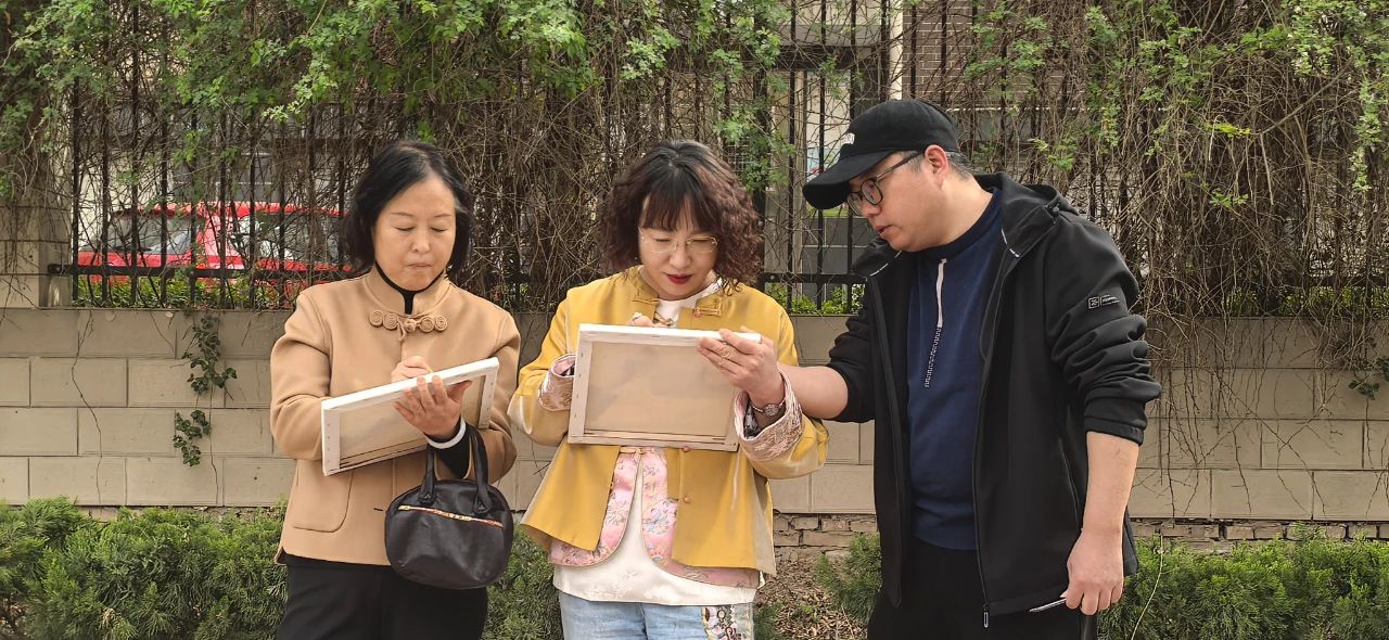 市文化馆手机短视频拍摄团队,走进“樱花大道”实地采风创作